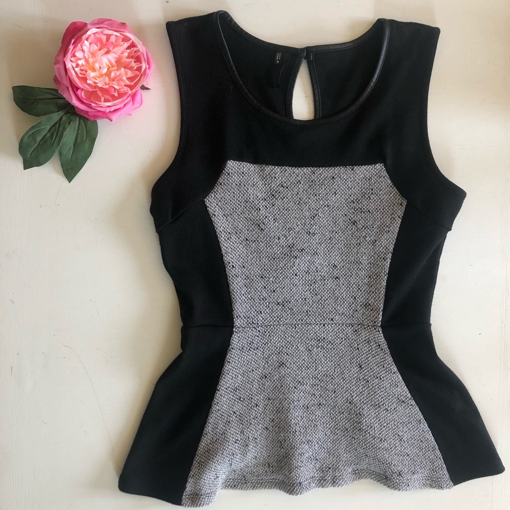 Sweet little peplum top by Maurice’s. Size small